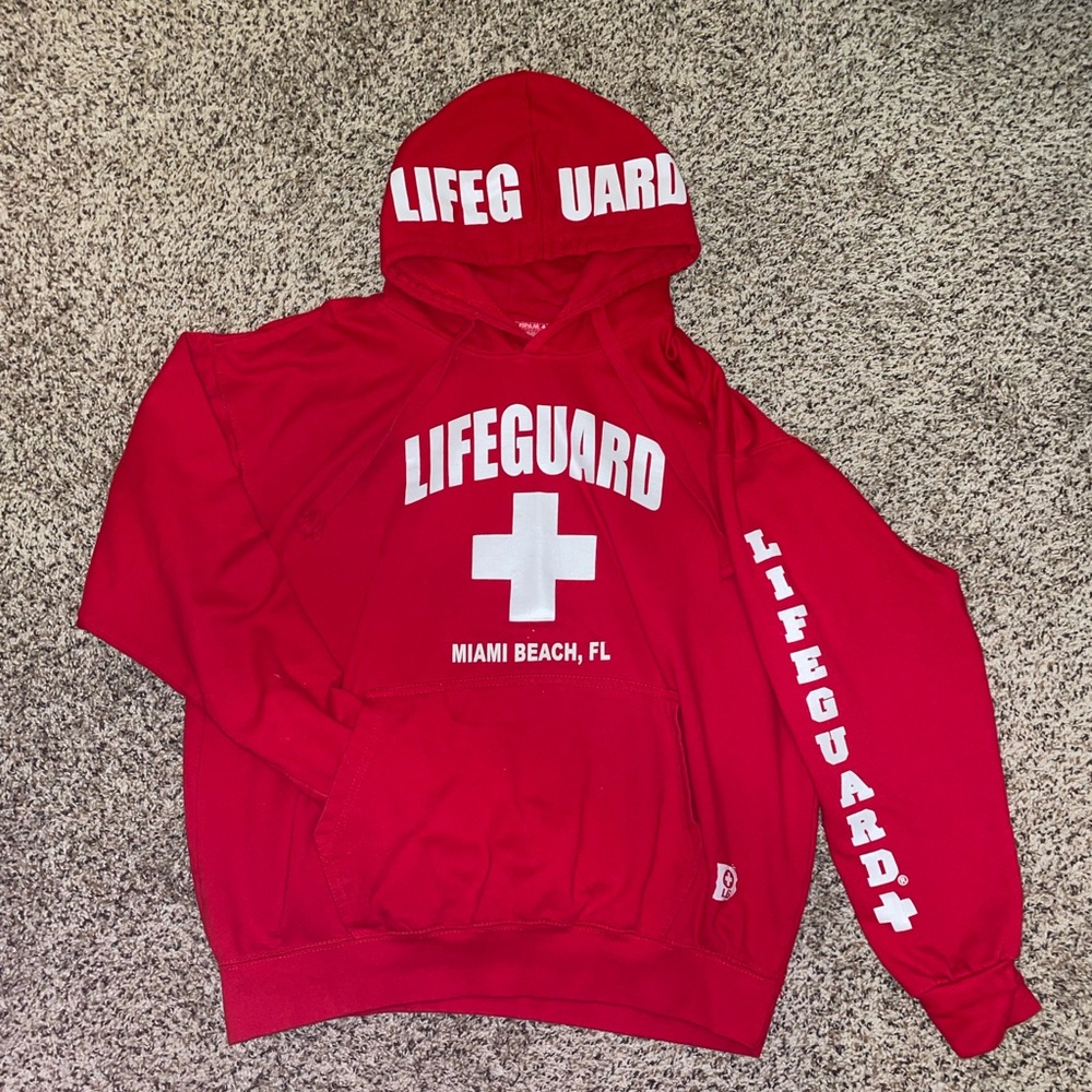Red lifeguard hoodie from Miami. Size XL.